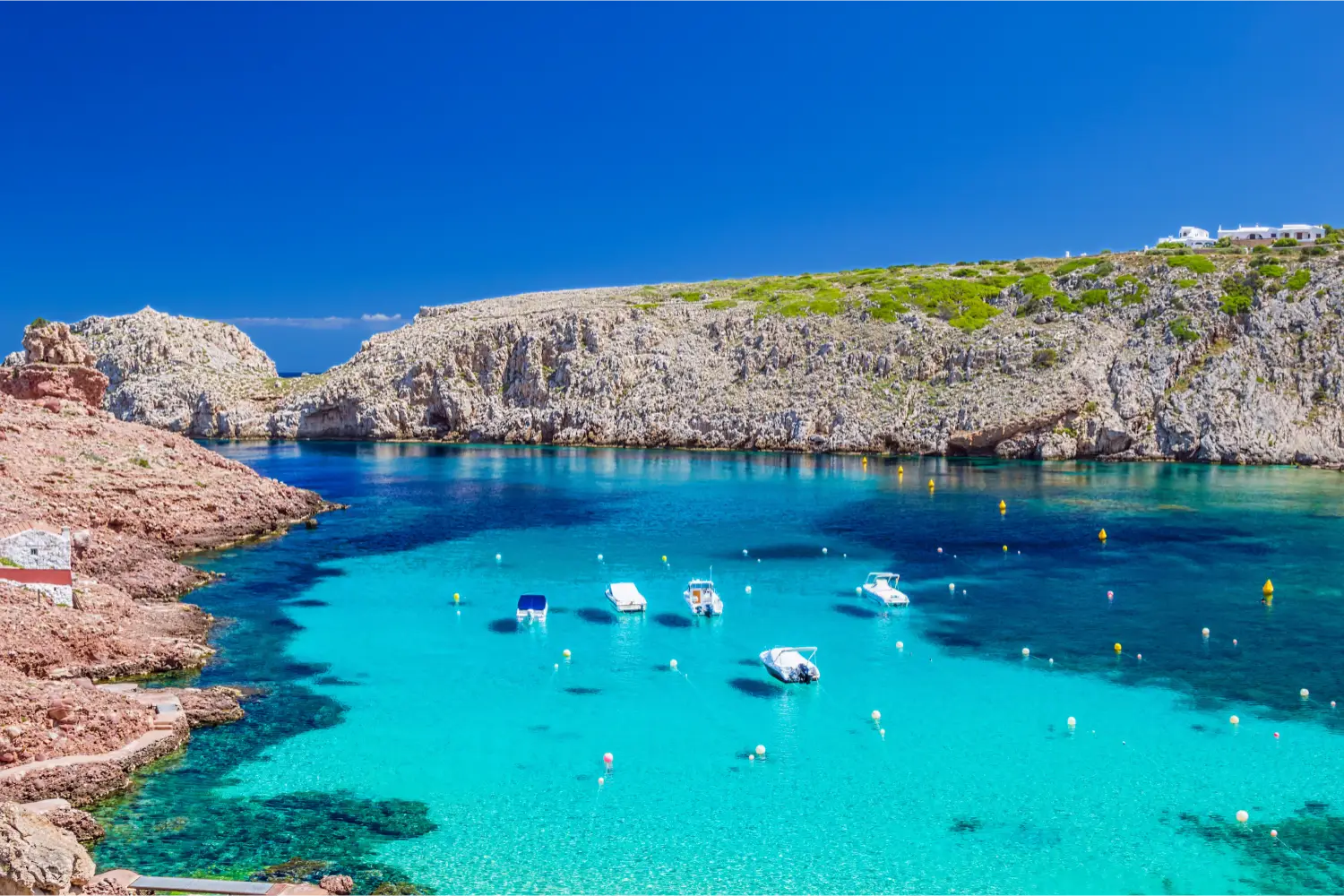 Crystal clear water in a small bay in the Balearic Islands