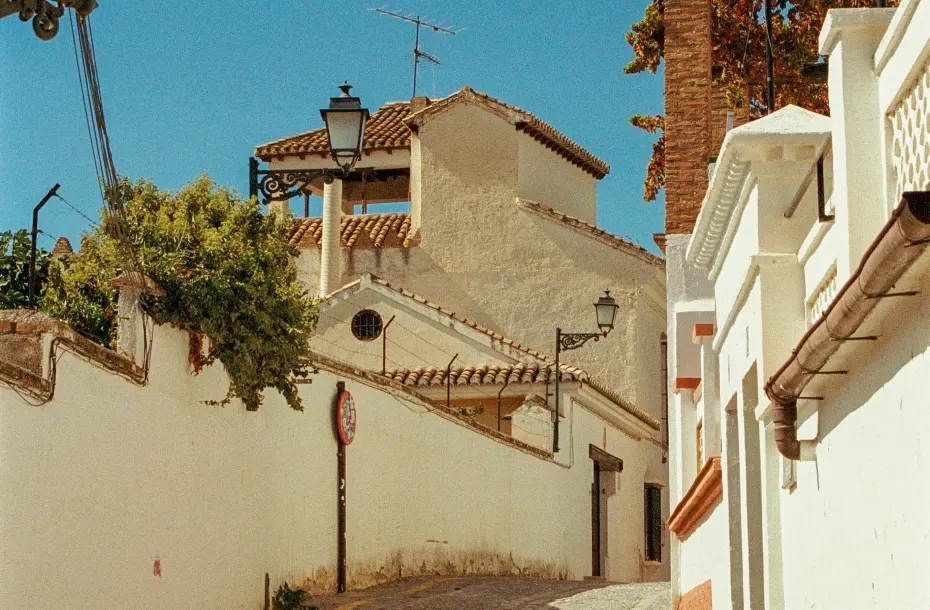 A quiet, paved neighborhood street in Motril, Spain