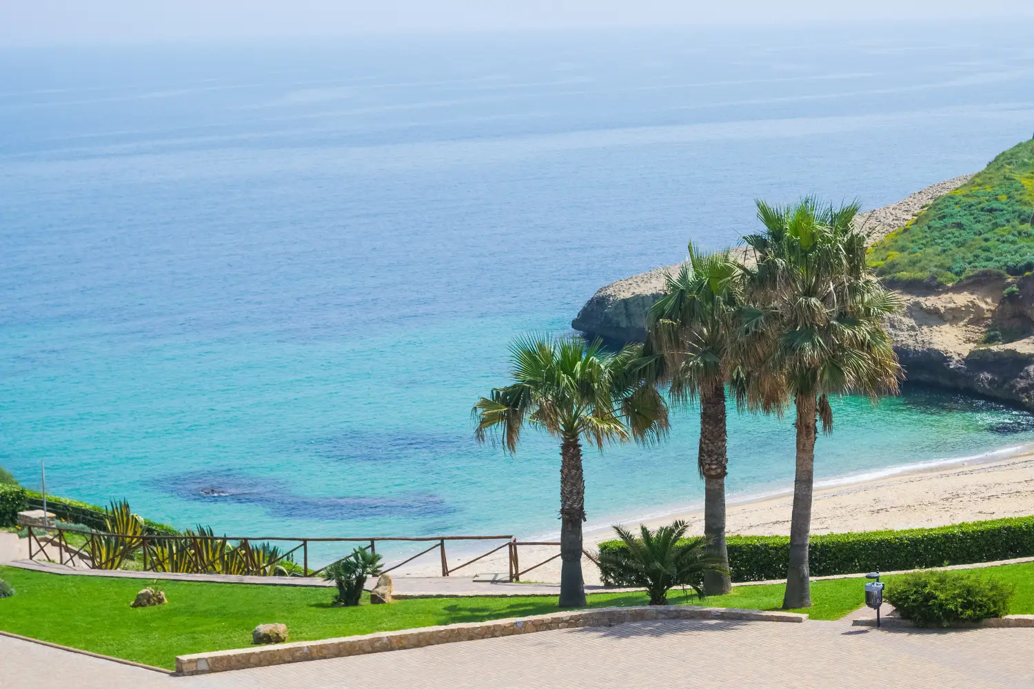 Small Park with pine trees By The Sea In Balai Beach, Porto Torres