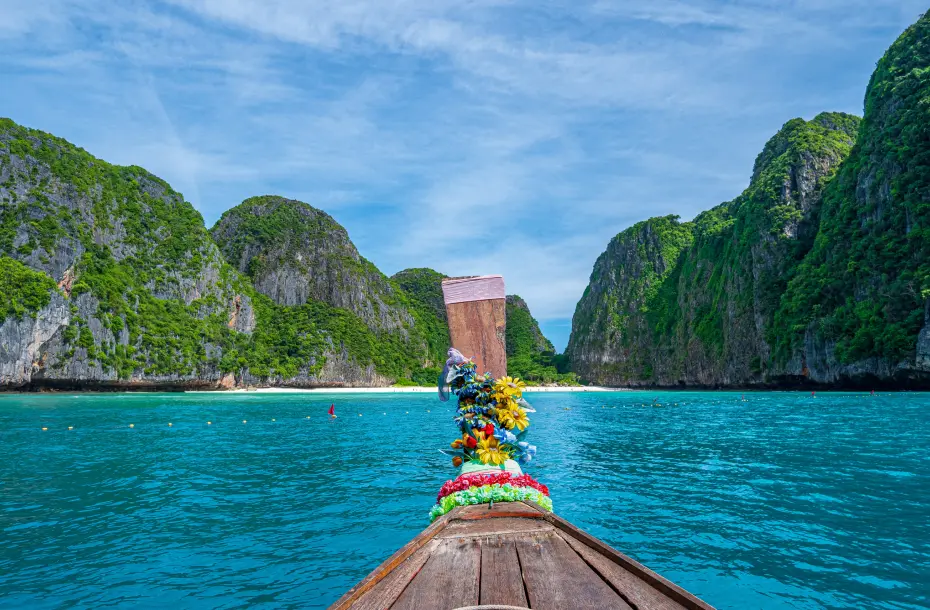 Wooden boat approaching Ko Phi Phi Island