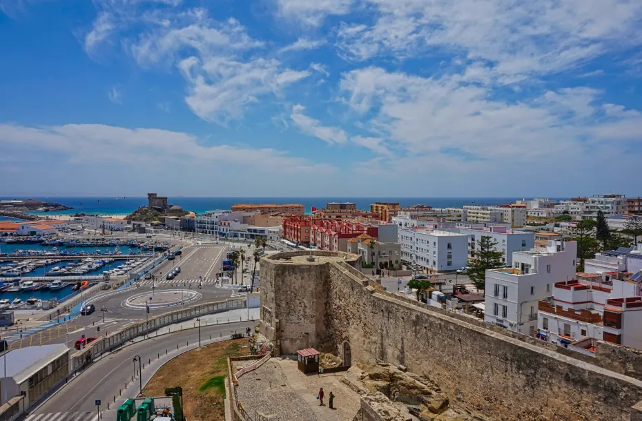 View of Castillo De Guzman El Bueno and the port of Tarifa in the background
