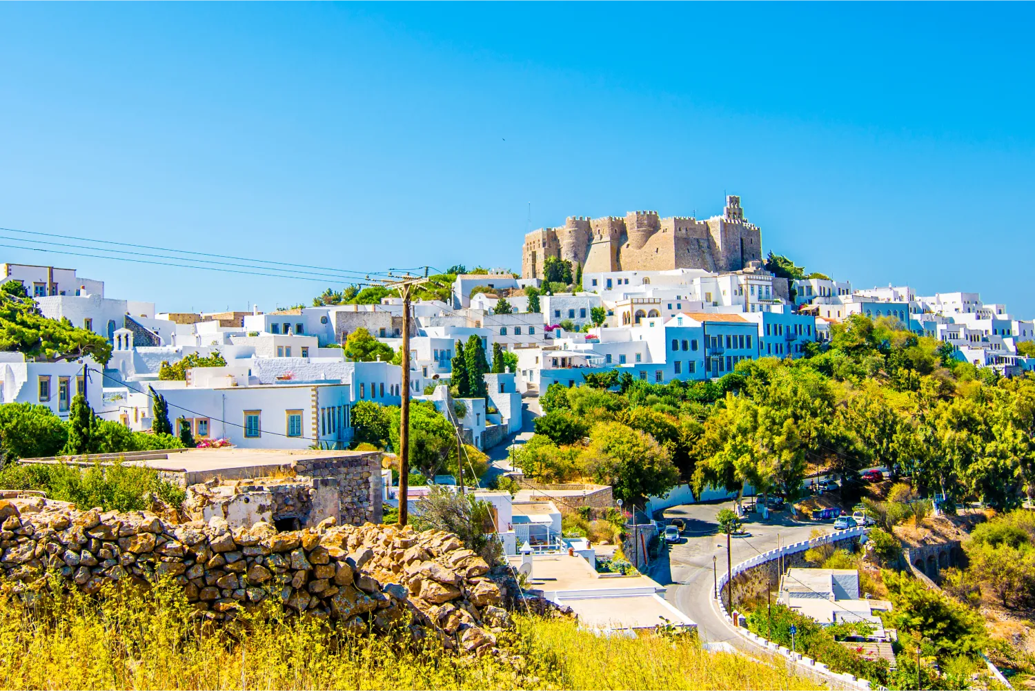 view of Patmos Chora with its dominating castle in the background
