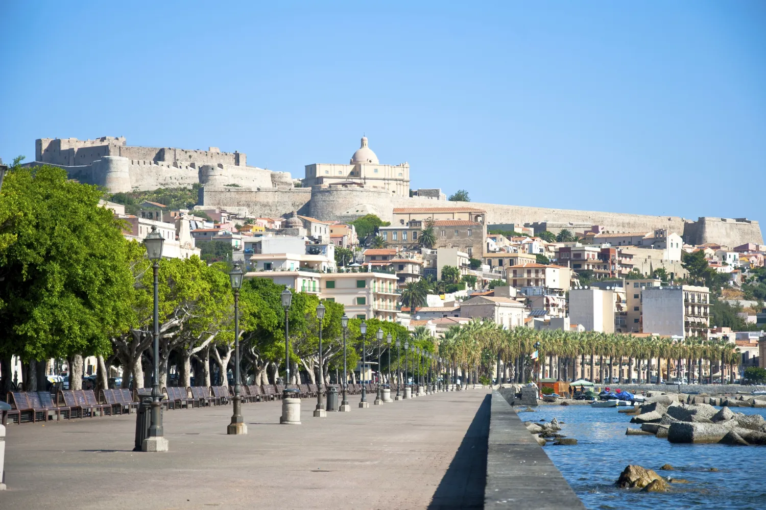 The marina of Milazzo with its beautiful promenade and the dominating castle in the background