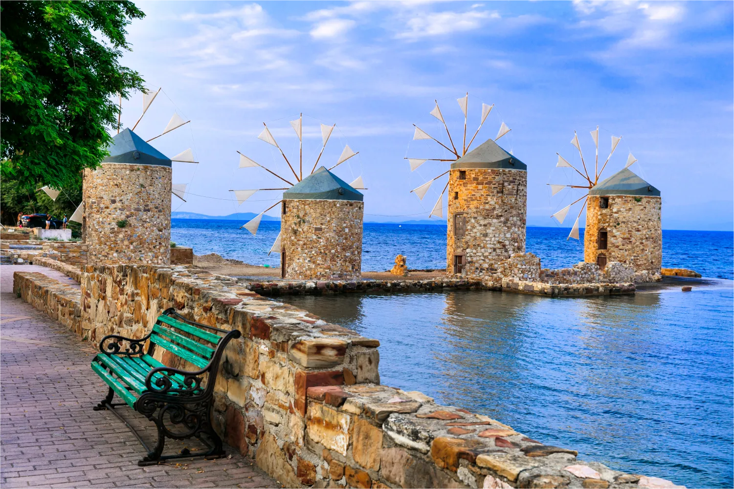 Series of Old Windmills Over the Sea In Chios Island