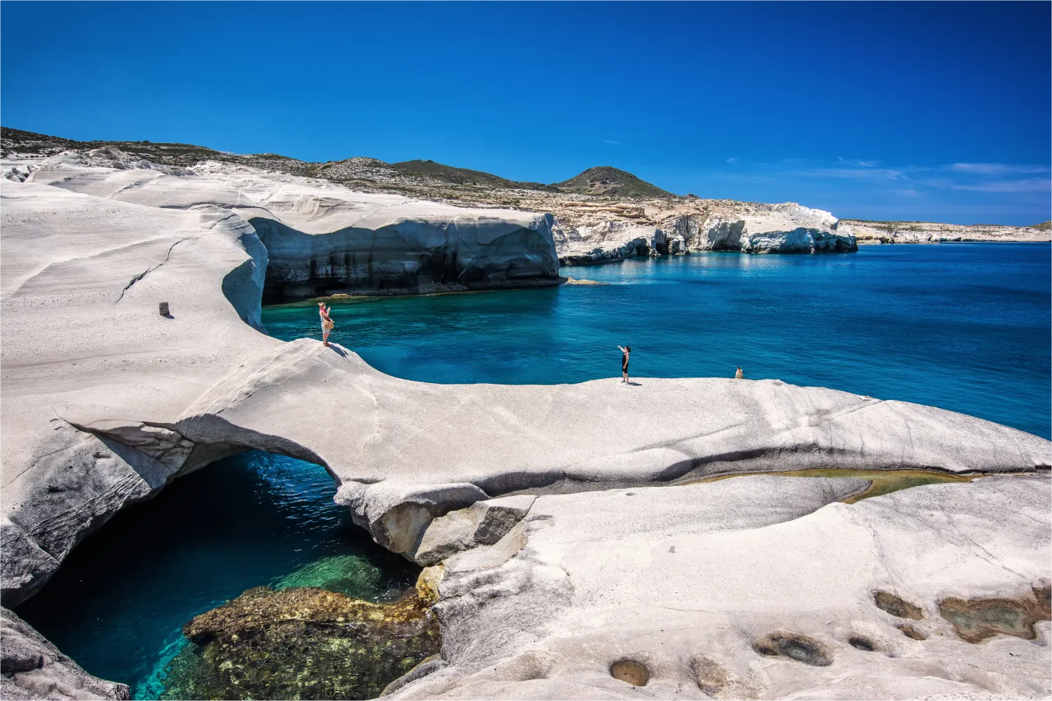 The stunning Sarakiniko Beach in Milos with its white rocks and blue waters