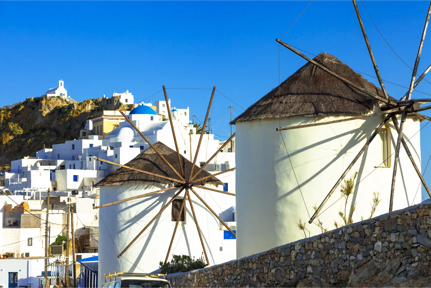 The windmills of Serifos and Chora in the background