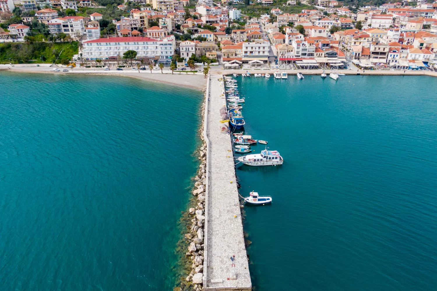 Aerial View Of Beautiful Astakos Town and a promenade near the port